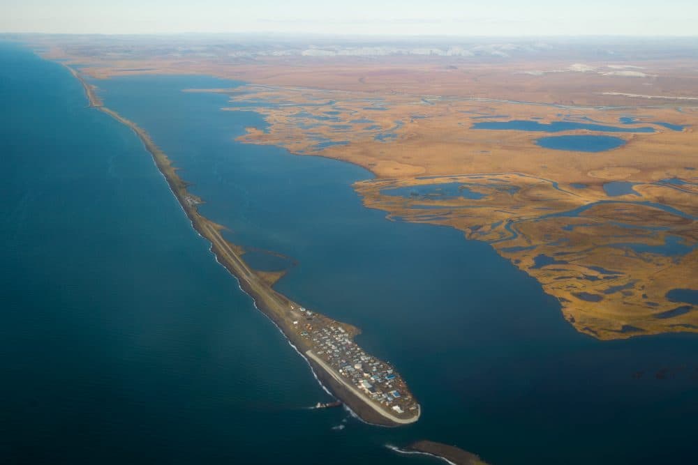 This aerial photo shows the island village of Kivalina, an Alaska Native community of 400 people already receding into the ocean as a result of rising sea levels, in September 2015, in Kotzebue, Alaska. (Andrew Harnik/AP)