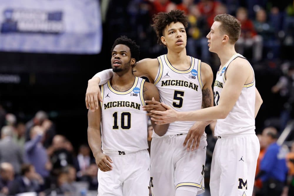 After their team plane skidded off the runway, the Michigan Wolverines went on to win the Big Ten tournament and reach the Sweet 16. (Joe Robbins/Getty Images)