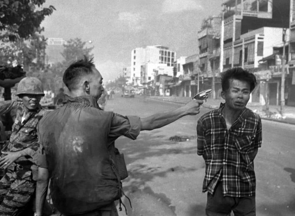 Gen. Nguyen Ngoc Loan, South Vietnamese chief of the national police, fires his pistol into the head of suspected Viet Cong official Nguyen Van Lem on a Saigon street early in the Tet Offensive, February 1, 1968. Photographer Eddie Adams reported that after the shooting, Loan approached him and said, “They killed many of my people, and yours too,” then walked away. (Eddie Adams/AP)