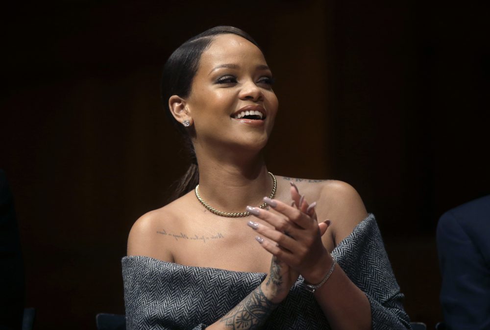 Rihanna applauds during Harvard University Humanitarian of the Year Award ceremonies before being presented with the award on Tuesday, Feb. 28, 2017. (Steven Senne/AP)