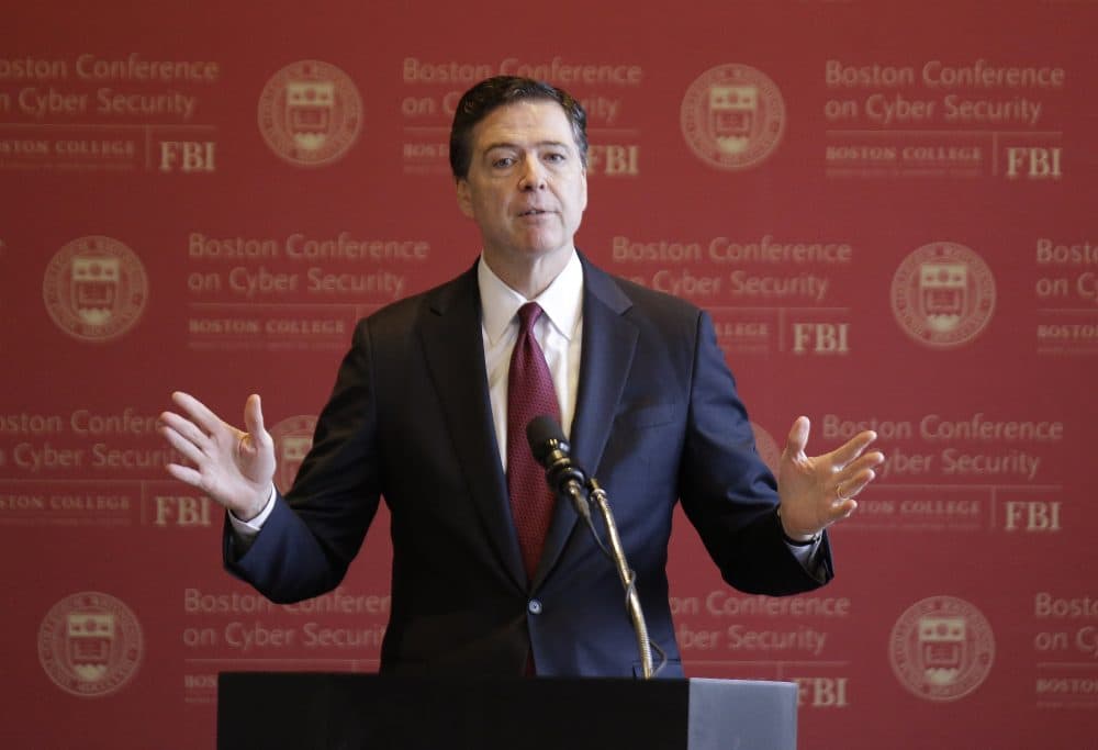 FBI Director James Comey delivers an address on cybersecurity at Boston College Wednesday. (Stephan Savoia/AP)