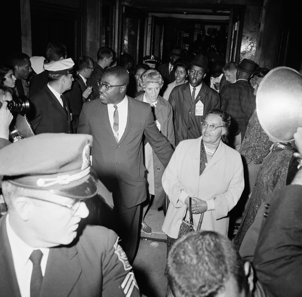 A group of 45 members of the NAACP led by Boston leader Kenneth Guscott, (left), leave headquarters of Boston school committee on Sept. 7, 1963, after staging a 3-day sit-in demonstration protesting what they term de factor segregation in Boston schools. (AP/FCC)