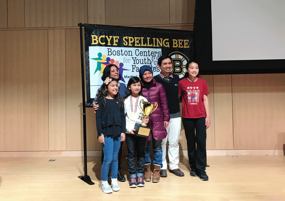 Farah Haniff (white shirt, center) with fellow spelling bee competitors. (Kassandra Sundt/WBUR)