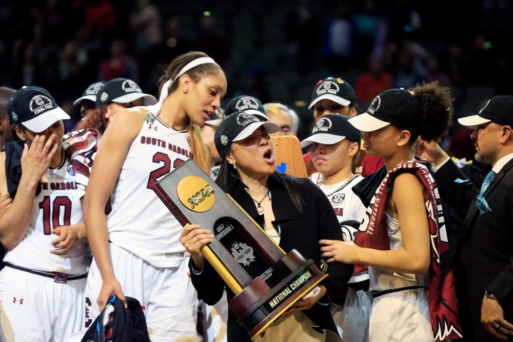 Dawn Staley holds the NCAA trophy after South Carolina's victory over Mississippi State. (Ron Jenkins/Getty Images)