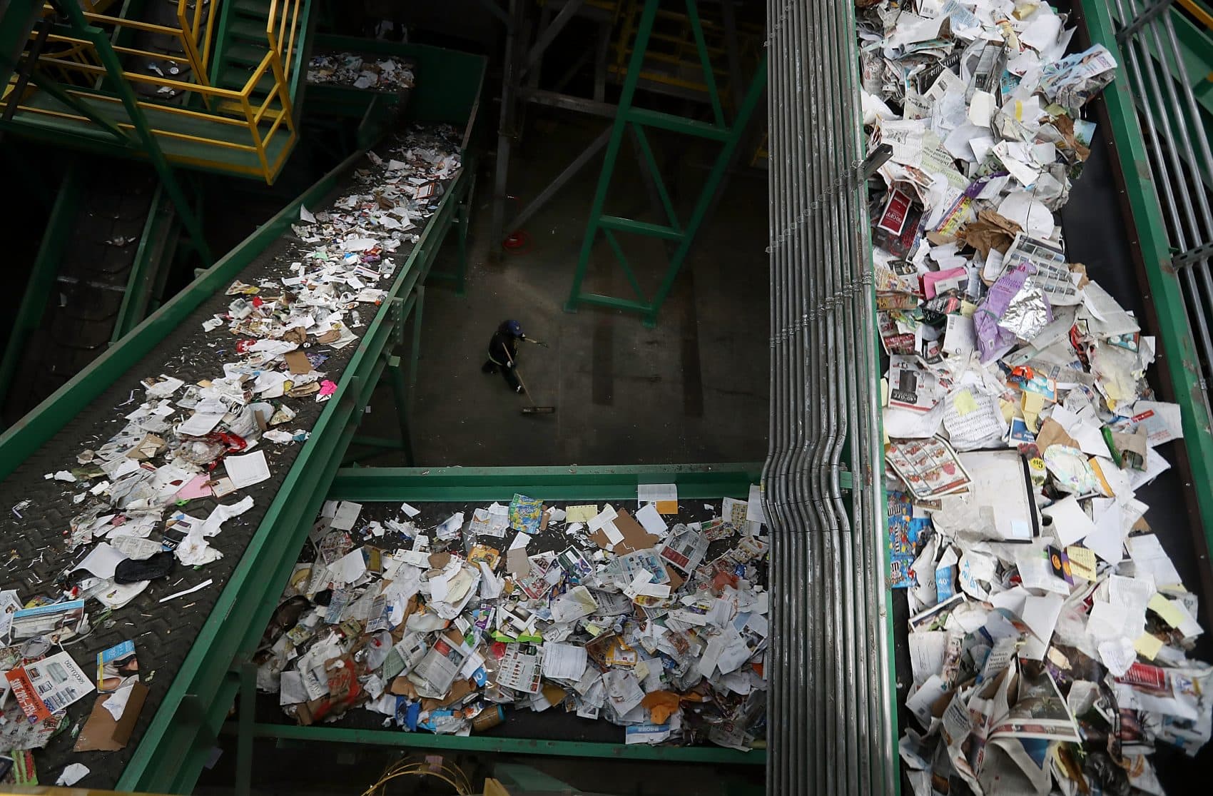 Conveyor belts carry recyclable materials through a sorting machine at Recology's Recycle Central in San Francisco. (Justin Sullivan/Getty Images)