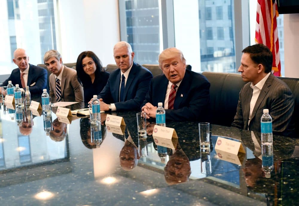 (Left to right) Amazon's chief Jeff Bezos, Larry Page of Alphabet, Facebook COO Sheryl Sandberg, Vice President-elect Mike Pence, President-elect Donald Trump and Peter Thiel, co-founder and former CEO of PayPal, during meetings at Trump Tower in New York in December 2016. (Timothy A. Clary/AFP/Getty Images)
