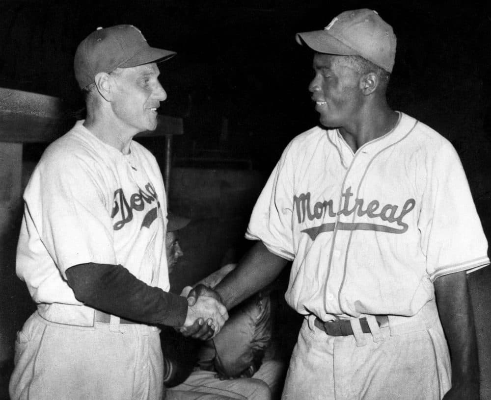 Former Dodgers manager Leo Durocher (left) and Jackie Robinson (right) feuded for decades. (AP)