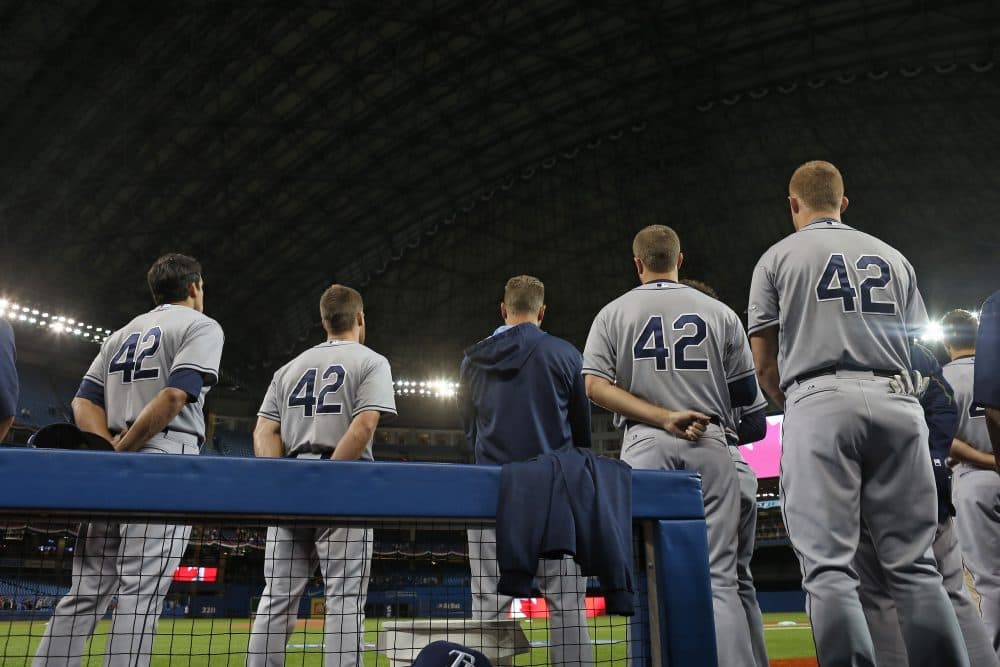 &quot;It’s a lovely gesture for each Major League player to wear his '42' on Jackie Robinson Day,&quot; Bill Littlefield writes. &quot;But wouldn’t Jackie Robinson be among the first to affirm that symbols and gestures are nothing compared to the eventual realization of genuine equal rights and opportunity, and the full realization of justice in all its manifestations for everybody?&quot; (Tom Szczerbowski/Getty Images)