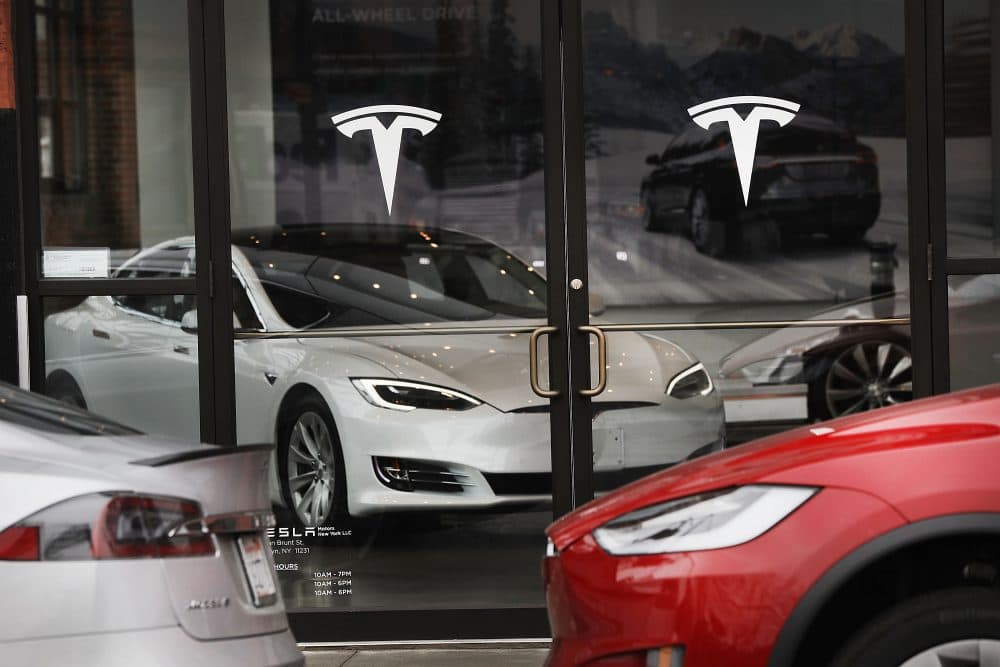 A Tesla car is displayed in a showroom at a Brooklyn Tesla dealership on April 4, 2017 in New York City. (Spencer Platt/Getty Images)