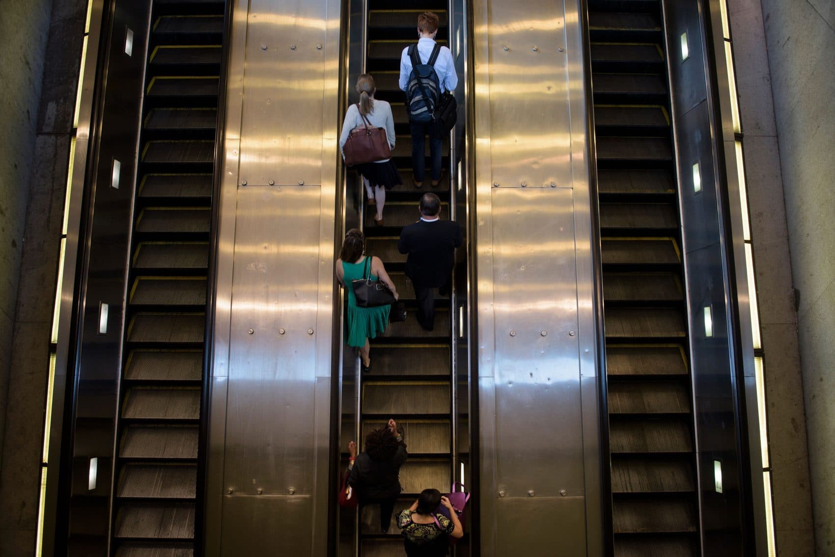 People ride an escalator to exit the Metro transit system in Washington, D.C. (Brendan Smialowski/AFP/Getty Images)