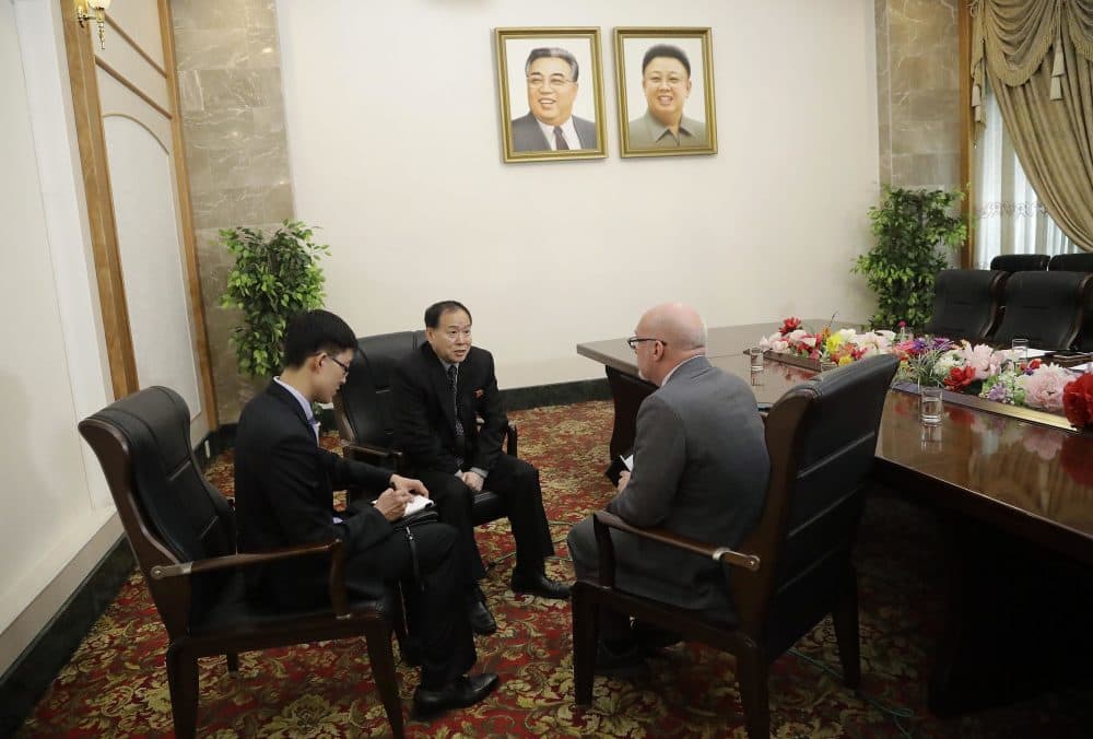 Han Song Ryol, center, North Korea's vice minister of foreign affairs speaks during an interview with Eric Talmadge, right, of The Associated Press on Friday, April 14, 2017, in Pyongyang, North Korea. (Wong Maye-E/AP)