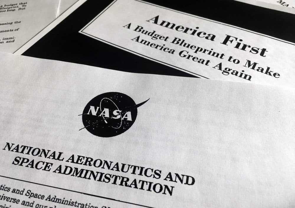A portion of President Trump's first proposed budget, focusing on the NASA, and released by the Office of Management and Budget, is photographed in Washington, Wednesday, March 15, 2017. (Jon Elswick/AP)