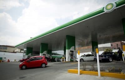 A customer pulls out of a BP gas station on the outskirts of Mexico City, Saturday, March 11, 2017. Until last year, all Mexican gas stations operated under the brand of the state-owned petroleum company Pemex. Now Pemex has competition from BP. (Eduardo Verdugo/AP)