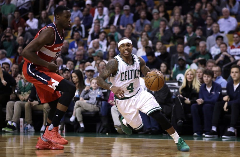 Boston Celtics guard Isaiah Thomas drives to the basket against the Wizards in March. (Charles Krupa/AP)