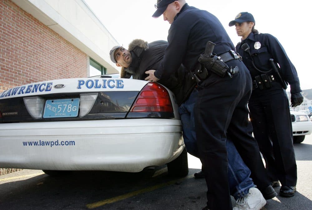 Mayor Dan Rivera's defense of an aggressive police officer, writes Alex Ramirez, is deeply troubling. Pictured: In this file photo, Luis Rivera, of Haverhill, is arrested by Lawrence Police Officers Carmen Purpora, front, and Eli Bernabe, in a supermarket parking lot in Lawrence on March 14, 2006. Rivera was charged in connection with shoplifting, resisting arrest, disorderly conduct, and possession of drug paraphernalia with intent to sell. (Steven Senne/AP)