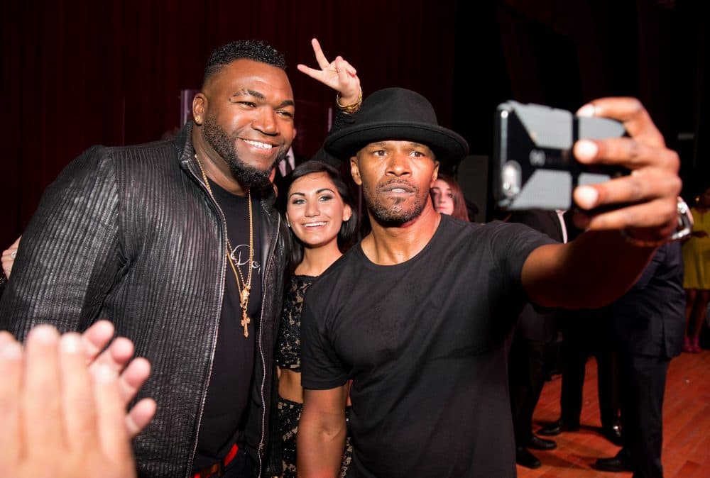 David Ortiz of the Boston Red Sox, Marina Varano and Jamie Foxx attend the STRIP by Strega Opening Party at the newly renovated Boston Park Plaza Hotel on Friday, April 17, 2015 in Boston. (Photo by Marc Andrew Deley/Invision/AP Images)
