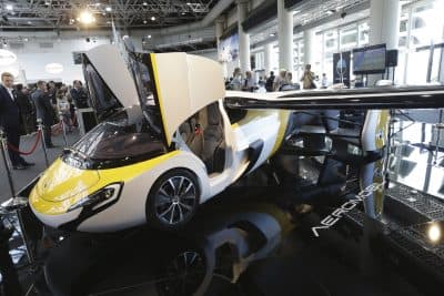 Why does this complicated and ambitious dream endure? asks Tom LeCompte, a pilot -- and a driver. Pictured: The latest version of a flying car called &quot;AeroMobil&quot;, a light frame plane with wings that can fold back, like an insect, boosted by a rear propeller, is displayed in Monaco, Thursday, April 20, 2017. The company said that its “AeroMobil is completely integrated aircraft as well as a fully functioning four-wheeled car, powered by hybrid propulsion.” (Claude Paris/AP)