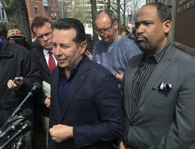Attorneys Jose Baez and Ronald Sullivan, who successfully defended former New England Patriots player Aaron Hernandez in a double-murder case, outside the state medical examiner's office (Collin Binkley/AP)