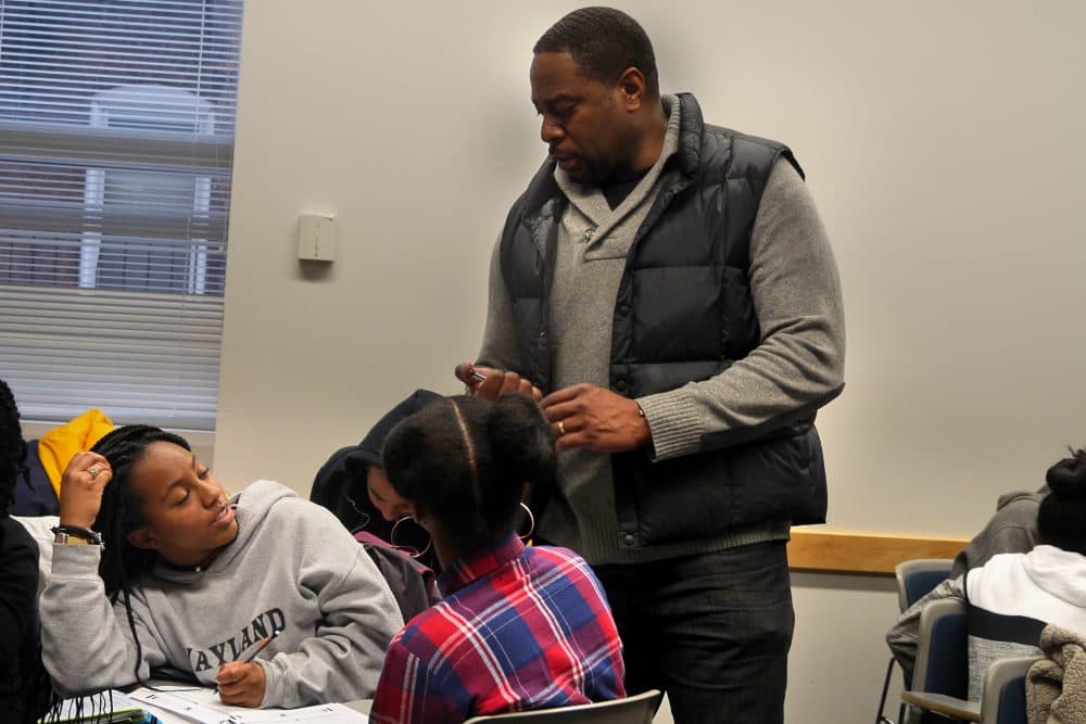 In 2017, Adrian Mims speaks to students during a Calculus Project session at Boston University. (Max Larkin/WBUR)