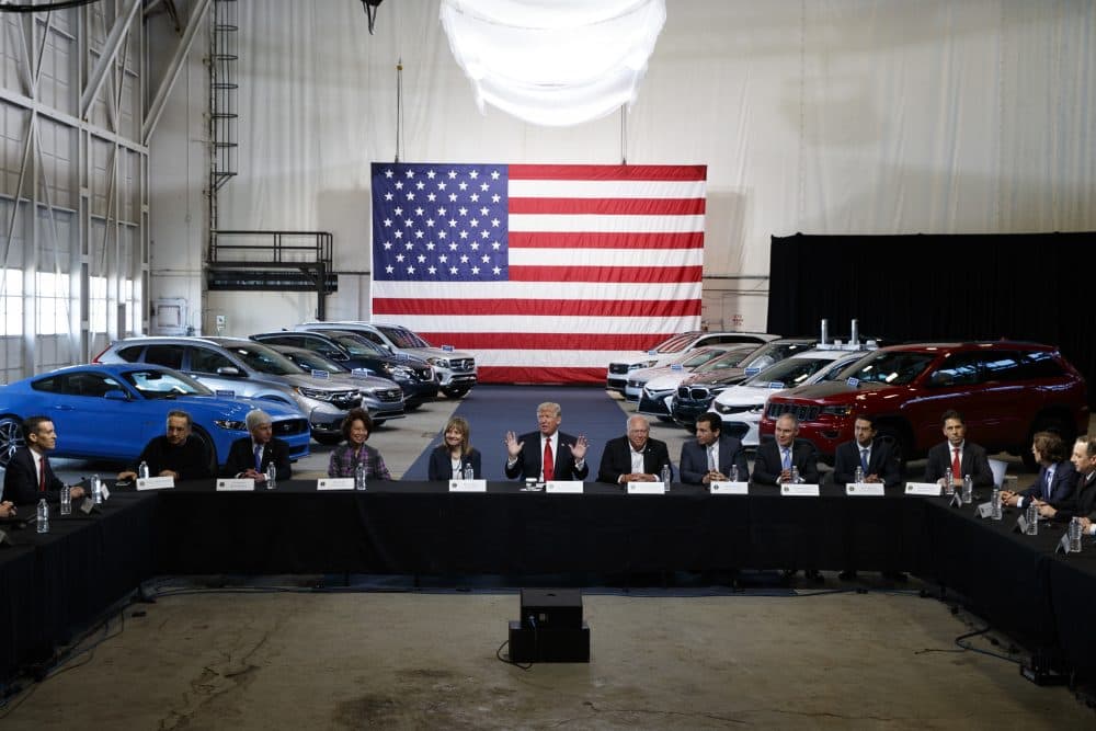 With his recent executive order rolling back Obama-era climate policy, writes Rich Barlow, Trump is looking like a national security wuss. Pictured here: President Trump hosts a roundtable discussion at the American Center of Mobility on March 15 in Michigan. Moving forcefully against Obama-era environmental rules, the president announced plans to re-examine federal requirements that regulate the fuel efficiency of new cars and trucks. (Evan Vucci/AP)