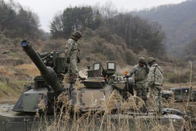 U.S. Army soldiers work on a tank during a military exercise in Paju, South Korea. (Ahn Young-joon/AP)