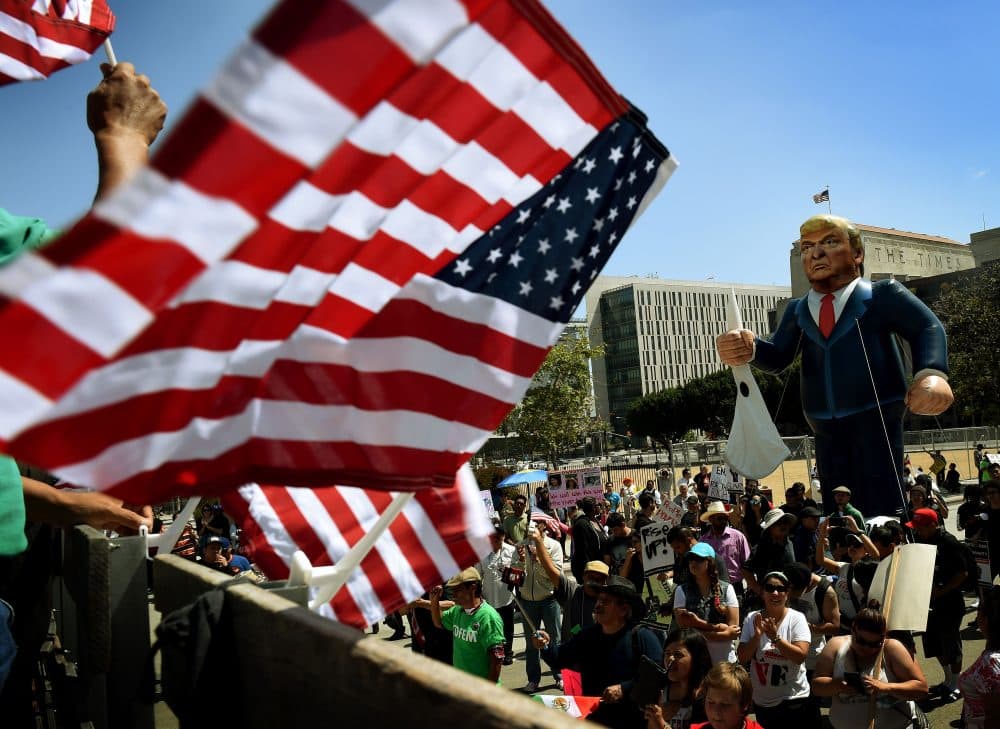 Members of the &quot;Full Rights for Immigrants Coalition&quot; displayed a giant effigy of then-candidate Donald Trump during a protest on May Day in Los Angeles in 2016. (Mark Ralston/AFP/Getty Images)