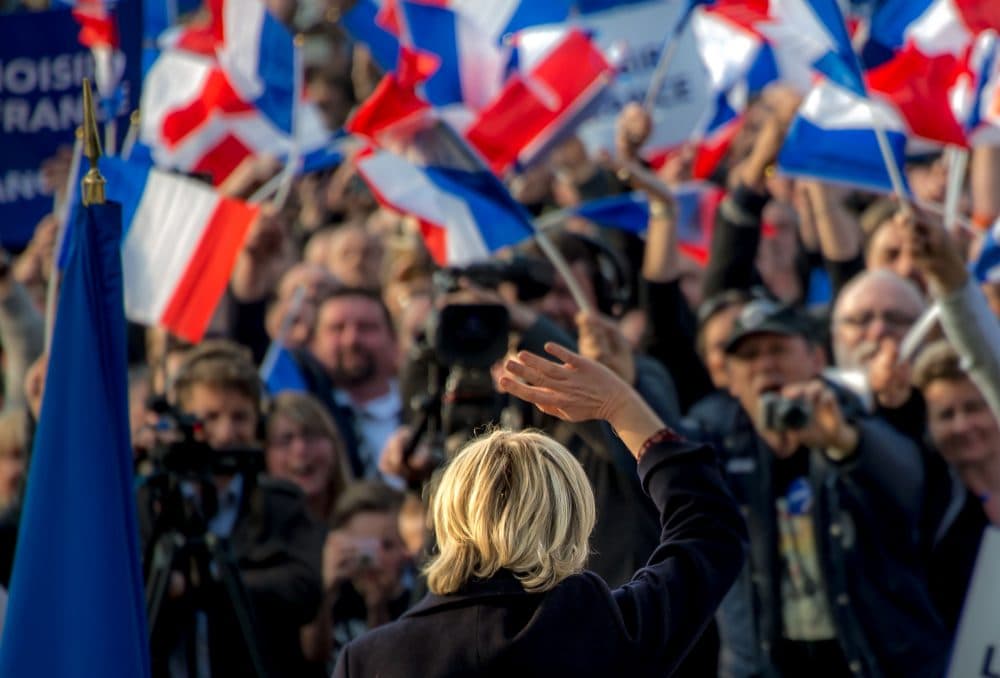French presidential election candidate for the far-right Front National (FN) party Marine Le Pen waves to supporters during a campaign rally prior to the election on May 4, 2017. (Philippe Huguen/AFP/Getty Images)