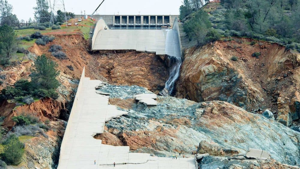 Ruins of the main spillway at Oroville Dam reveal a blend of &quot;fresh&quot; (blue-gray) rock and &quot;weathered&quot; (reddish-brown) rock underneath. (Calif. Dept. of Water Resources)