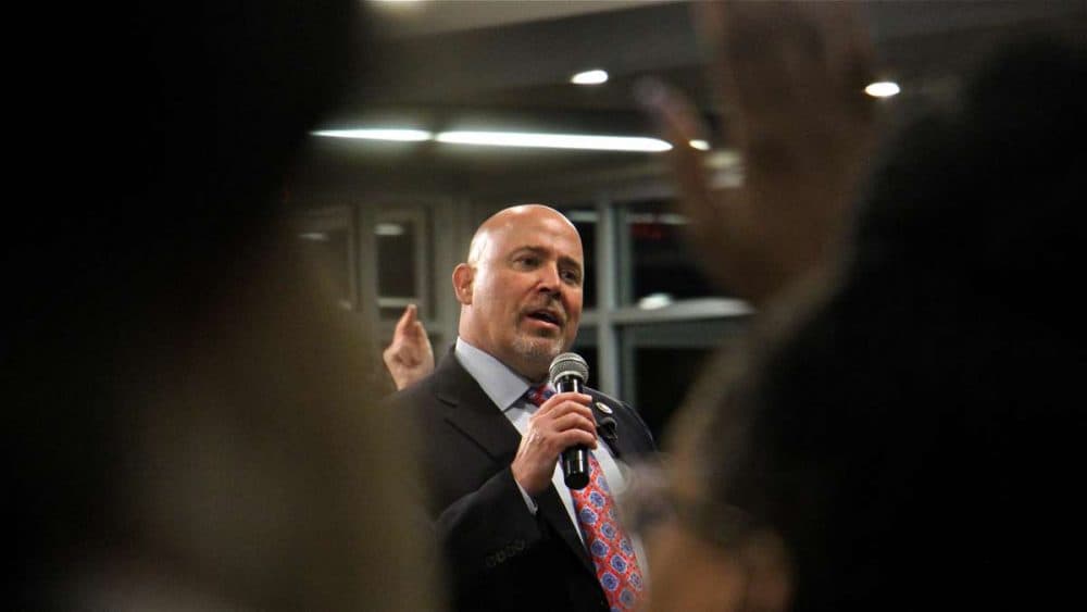 New Jersey Congressman Tom MacArthur faces a tough crowd in Willingboro, N.J. (Emma Lee/WHYY)