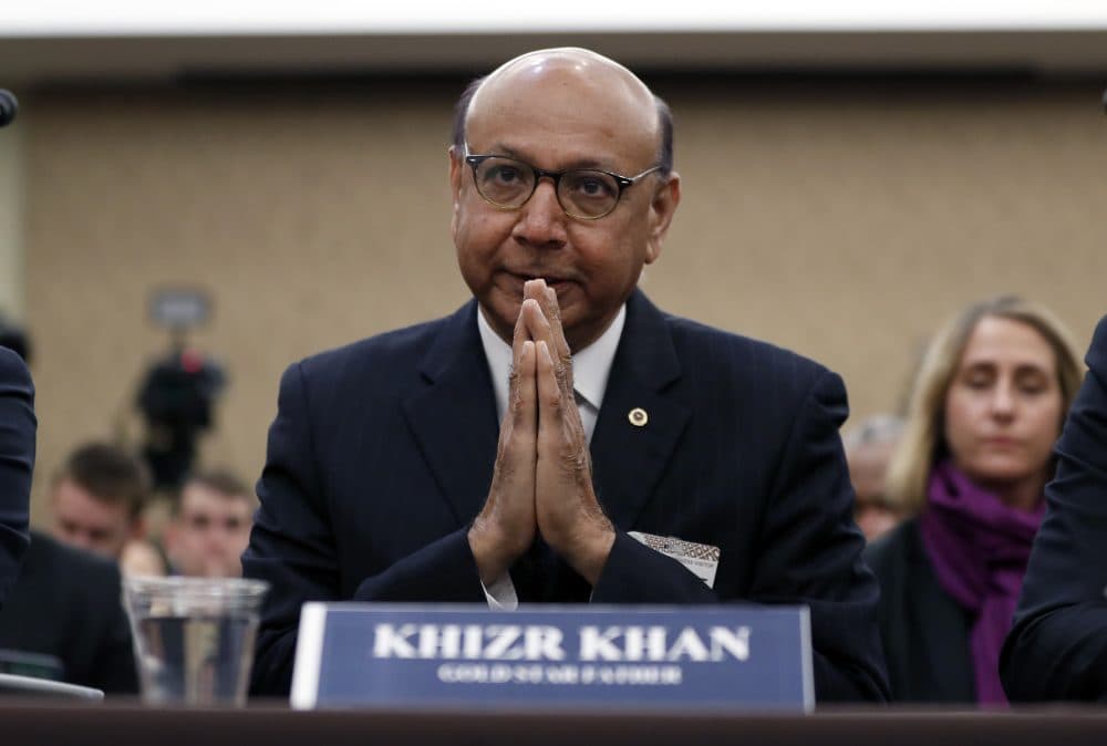 Khizr Khan, a Pakistani-American lawyer and Gold Star father, reacts as he is introduced during a House Democratic forum on President Trump's executive order on immigration. (Alex Brandon/AP)
