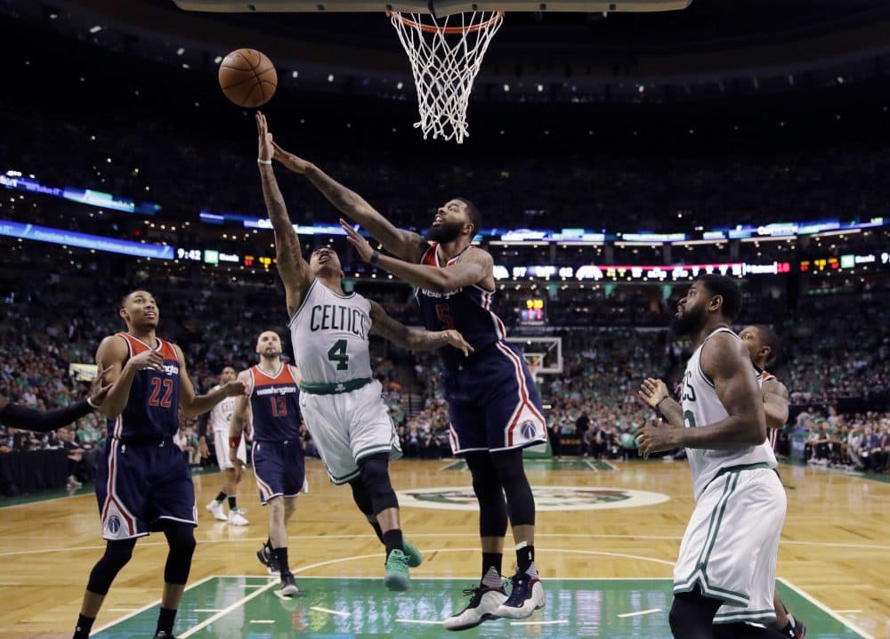 Boston Celtics guard Isaiah Thomas (4) drives against Washington Wizards forward Markieff Morris (5) during the fourth quarter of Game 7 of a second-round NBA basketball playoff series on Monday. (Charles Krupa/AP)