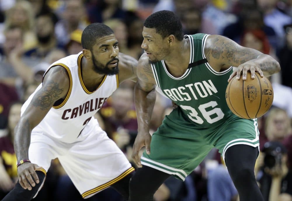 Boston Celtics' Marcus Smart (36) looks to drive on Cleveland Cavaliers' Kyrie Irving (2) during the second half of Game 3 on Sunday. (Tony Dejak/AP)