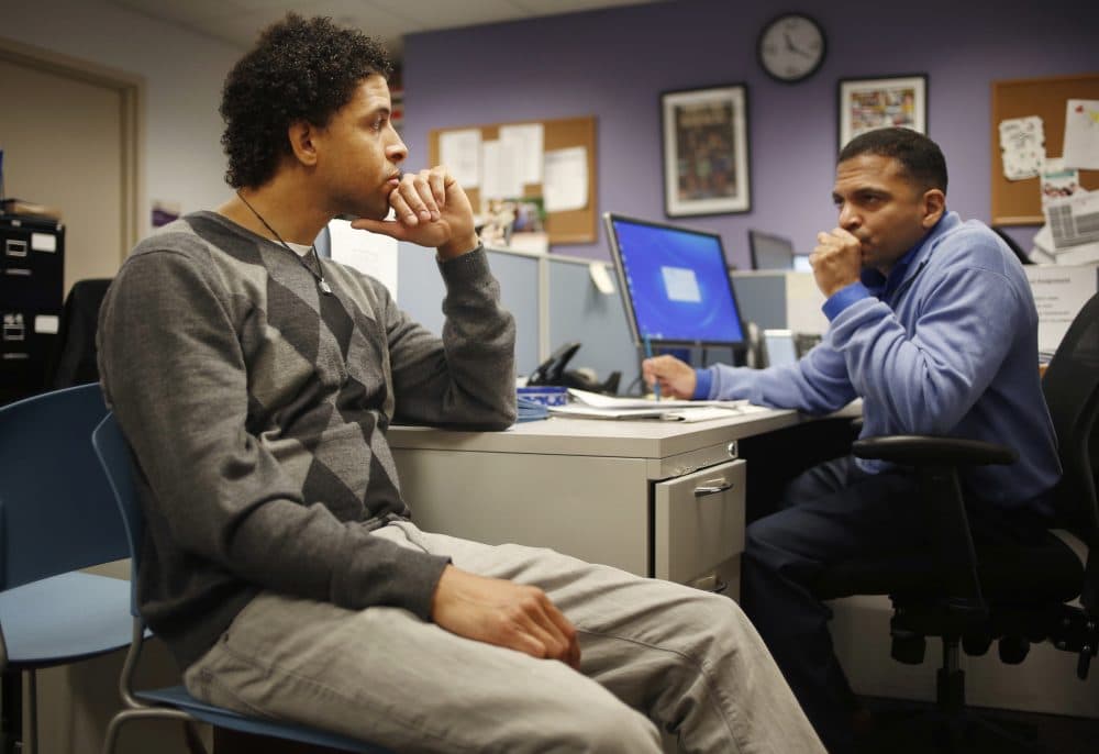 In this Thursday, April 20, 2017 photo, Neftali Thomas Diaz, left, talks with his case manager, David Rodriguez, at The Fortune Society in New York. New York City is betting that Diaz and other low-level offenders like him are right about the salvation in second-chance employment. Mayor Bill de Blasio said the city will spend $10 million a year on a “jails to jobs” initiative that will guarantee all Rikers inmates serving sentences of a year or less a chance at short-term employment once they do their time. (Seth Wenig/AP)