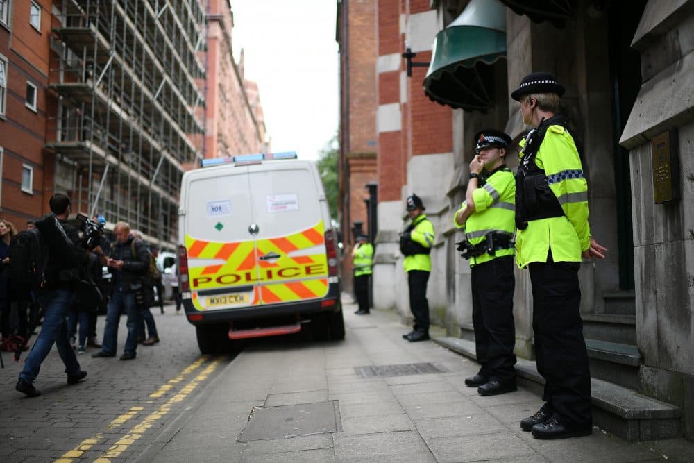 Police guard the entrance to Granby House in the city center following an armed raid, on May 24, 2017, in Manchester, England. (Jeff J Mitchell/Getty Images)