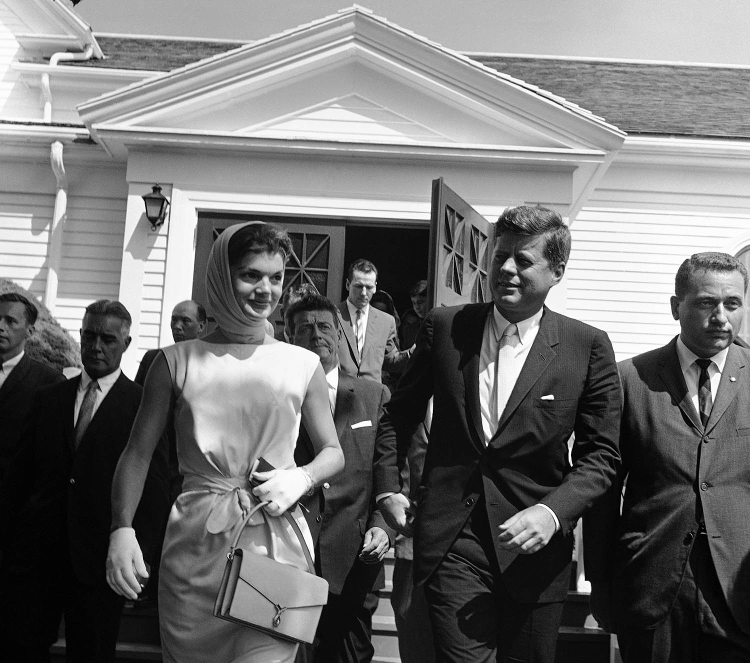 President John F. Kennedy and wife Jacqueline leave St. Francis church after attending mass at Hyannis Port, Mass., on July 23, 1961. (Frank C. Curtin/AP)
