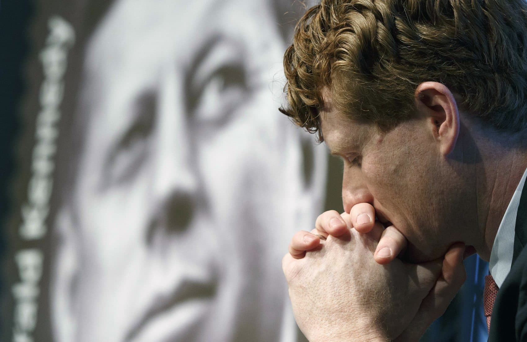 Rep. Joseph P. Kennedy III, D-Mass., listens during the dedication ceremony for the John F. Kennedy Centennial Stamp at the John F. Kennedy Library in Boston in February. (Michael Dwyer/AP)