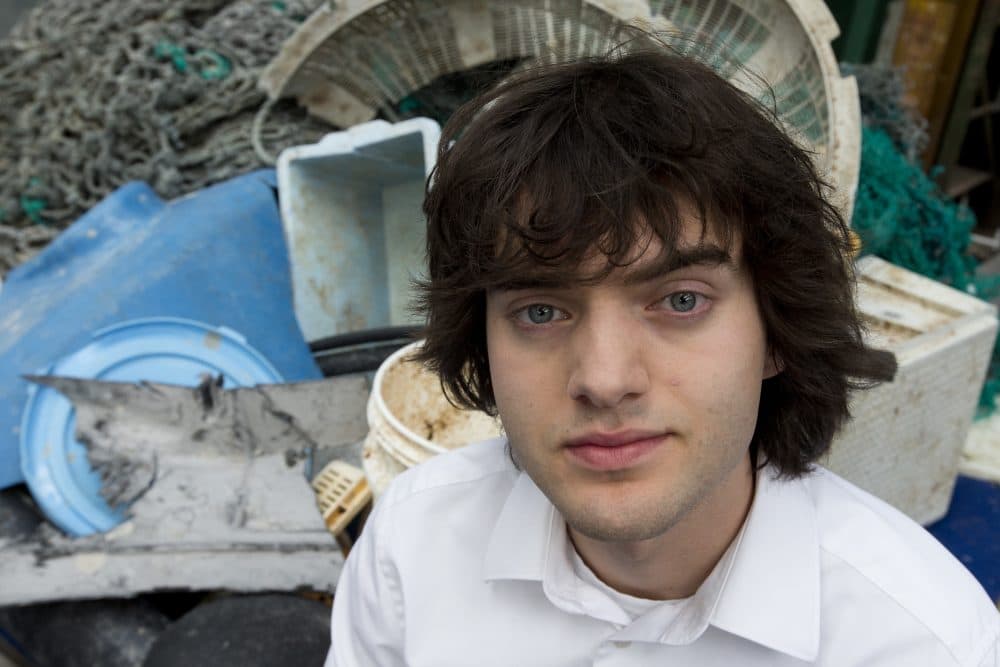 Dutch university dropout Boyan Slat, who founded the The Ocean Cleanup, poses for a portrait next to a pile of plastic garbage prior to a press presentation in Utrecht, Netherlands, Thursday, May 11, 2017. The foundation aiming to rid the world's oceans of plastic says it will start cleaning up the huge patch of floating junk known as the Great Pacific Garbage Patch within the next 12 months, two years ahead of schedule. (Peter Dejong/AP)