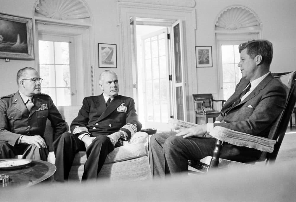President John F. Kennedy meets with Marine Corps Commandant Gen. David Shoup, left, and Chief of U.S. Naval Operations, Adm. George Anderson, at the White House on Oct. 29, 1962. (William J. Smith/AP File)