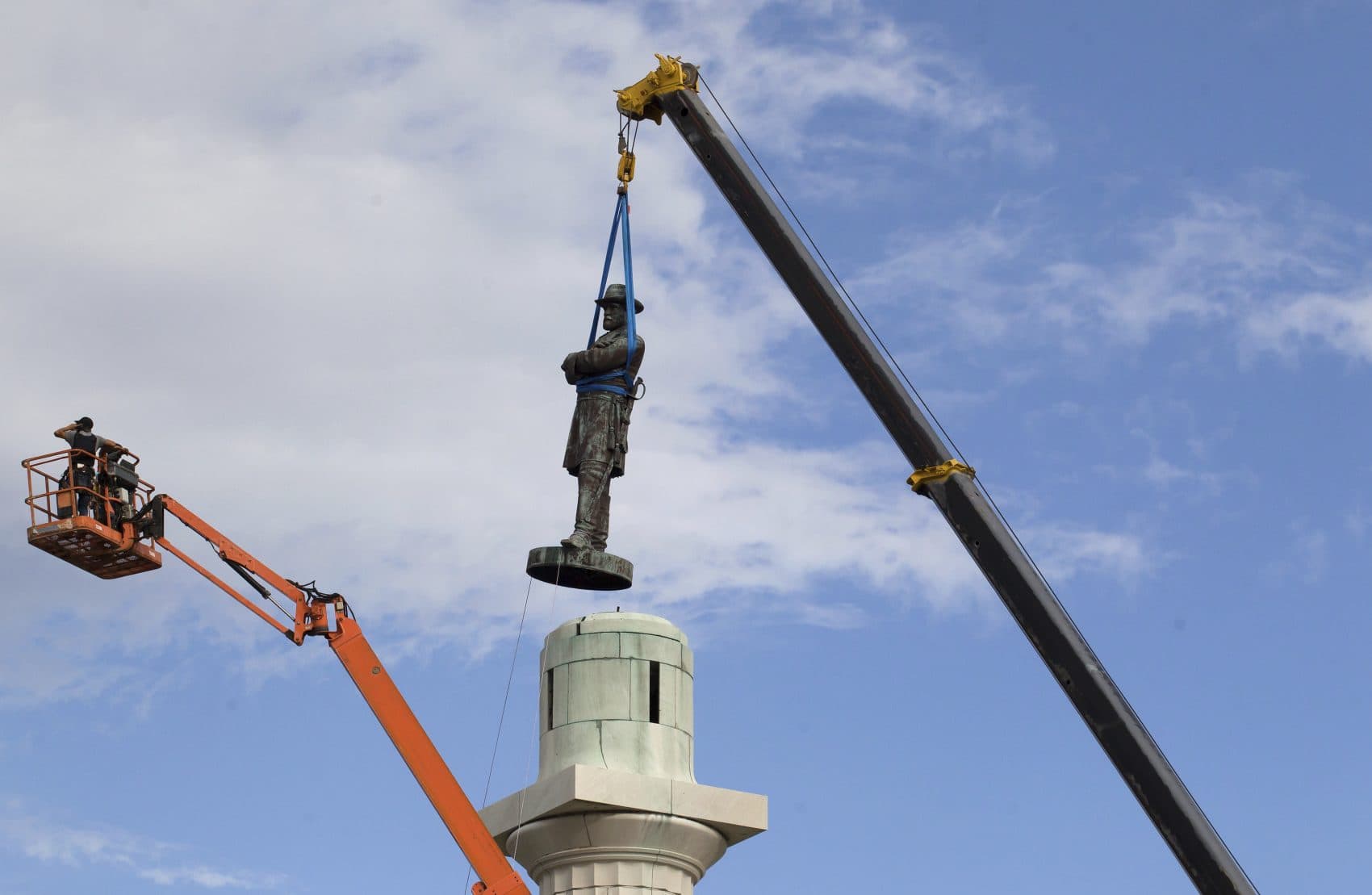 Good for news for New Orleans. But how should we deal with such sinful remainders of slavery’s past in the celebrated precincts of Boston? asks Kevin C. Peterson. Pictured: A statue of Confederate General Robert E. Lee is removed from Lee Circle Friday, May 19, 2017, in New Orleans. (Scott Threlkeld/AP)