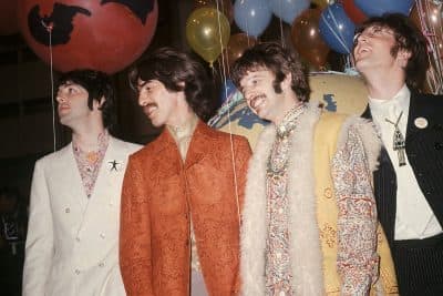  In this June 1967 photo, Paul McCartney, from left, George Harrison, Ringo Starr and John Lennon of The Beatles appear backstage during a break in rehearsals for the live broadcast on the &quot;Our World&quot; program at EMI studios in London. (AP Photo, File)