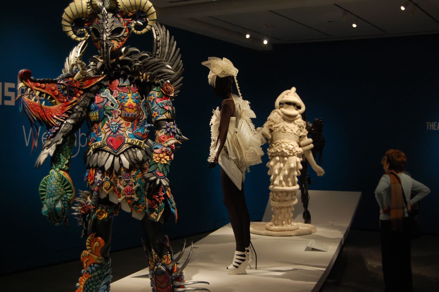 “Inkling” (at left) by Gillian Saunders at Peabody Essex Museum's exhibit of &quot;WearableArt.&quot; (Greg Cook/WBUR)