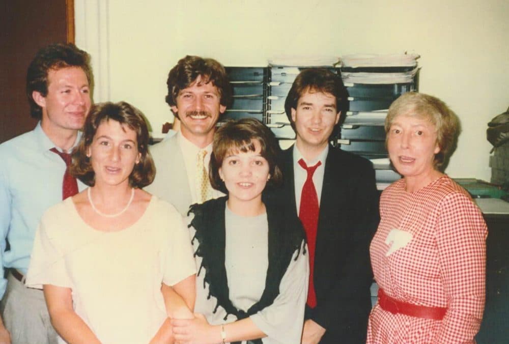 Helen Woodman Harrington, far right, with some of &quot;The Kids&quot; -- from left to right, Thor Jourgensen, Lisa Capone, Ted Frier, Julie Lanza and Dom Slowey -- standing in front of the State House News Service office at the State House. (Courtesy Lisa Capone)