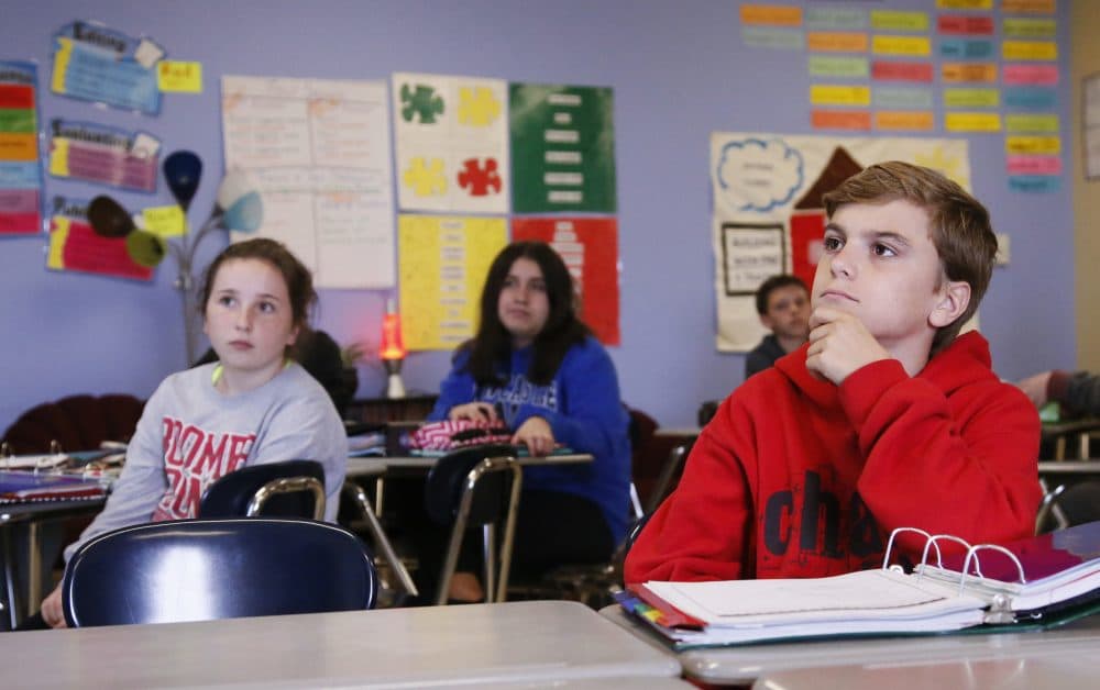 In this Thursday, March 30, 2017 photo, Hudson Hites listens during a seventh grade English class at Newcastle Middle School in Newcastle, Okla. Newcastle Public Schools have moved to a four day school week in response to Oklahoma's Budget Woes. (Sue Ogrocki/AP)