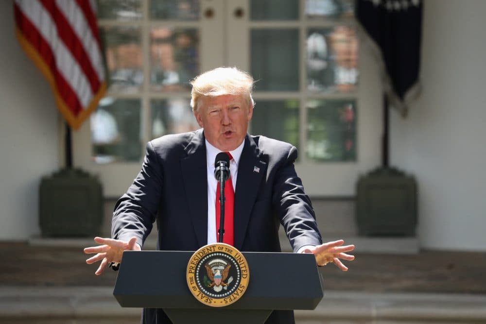 President Trump speaks about the U.S. role in the Paris climate change accord in the Rose Garden on Thursday in Washington. (Andrew Harnik/AP)