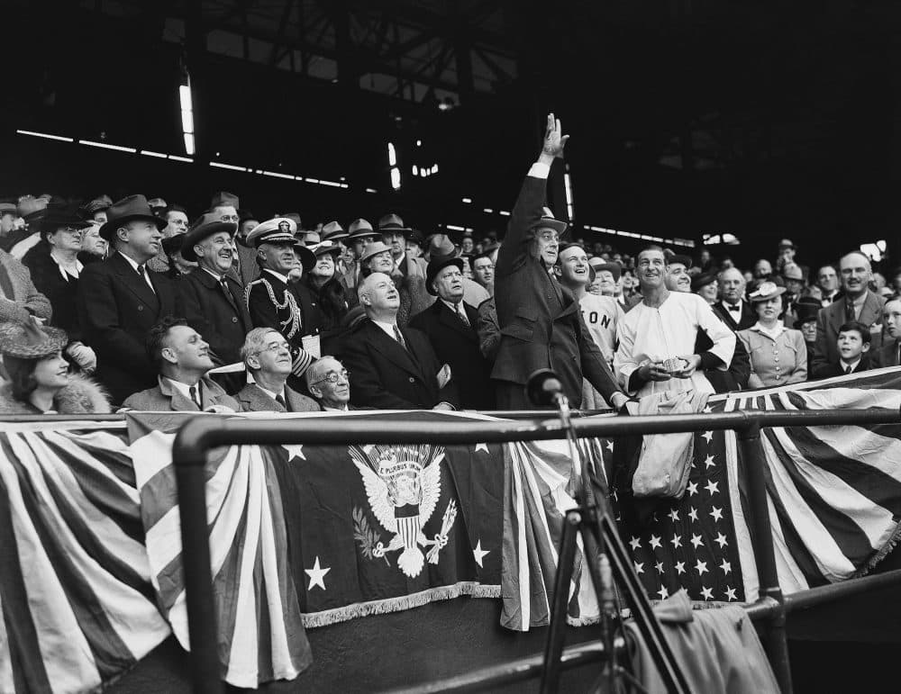 Once WWII began, President Franklin Roosevelt (shown above in 1940) stopped attending Opening Day at Washington's Griffith Stadium. But Major League Baseball continued. (AP)