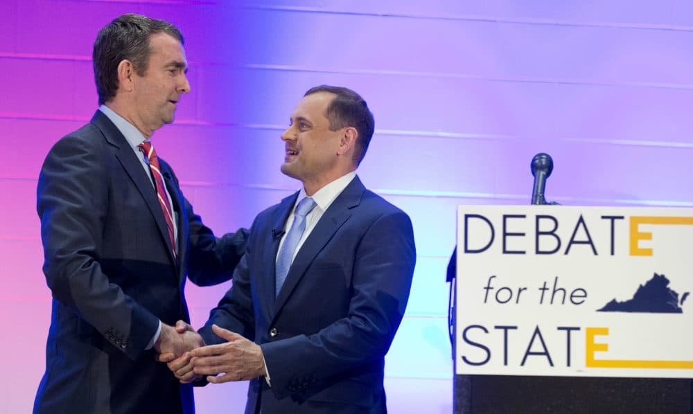 Democratic gubernatorial candidates Lt. Gov. Ralph Northam, left, and former Congressman Tom Perriello, right, shake hands after a debate in Richmond, Va., in May. (Steve Helber/AP)