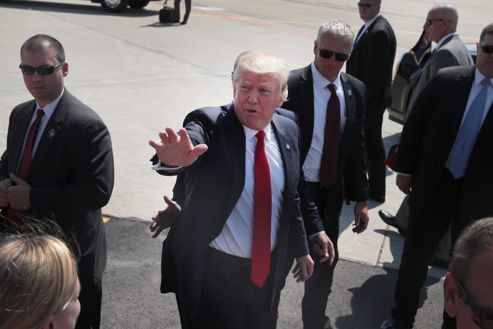 U.S. President Donald Trump greets guests after arriving at General Mitchell International Airport on June 13, 2017 in Milwaukee, Wis. (Scott Olson/Getty Images)