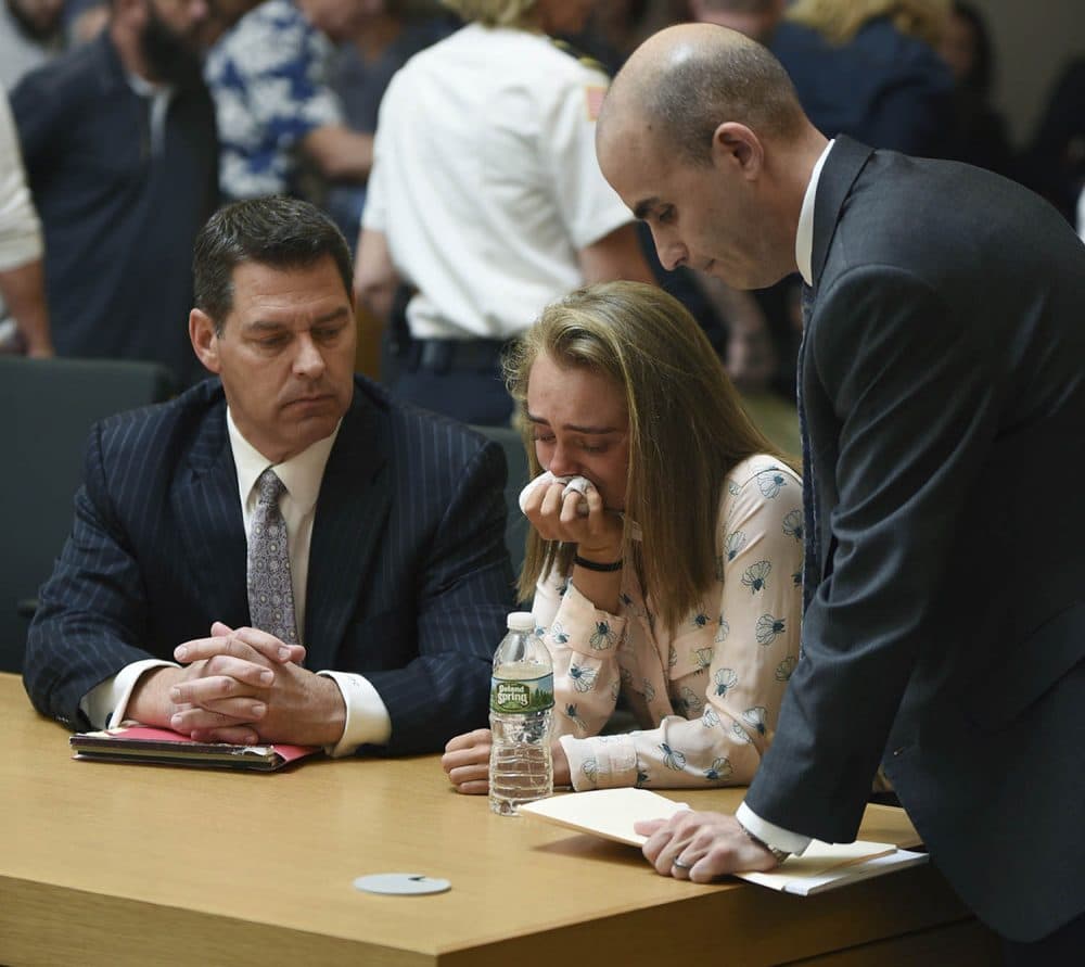 Michelle Carter cries while flanked by defense attorneys Joseph Cataldo, left, and Cory Madera, after being found guilty of involuntary manslaughter in the suicide of Conrad Roy III. (Glenn C.Silva/Fairhaven Neighborhood News, Pool)