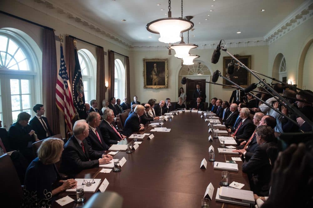 There are more than 1,100 positions in the U.S. government that require a president's nomination and Senate approval. Only 42 of President Trump's nominees have been approved. Pictured: President Trump (center) at a White House Cabinet meeting in June. (Nicholas Kamm/AFP/Getty Images)