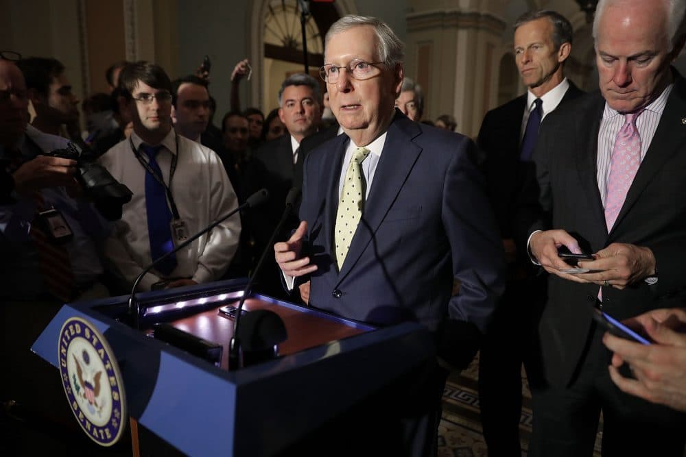 U.S. Senate Majority Leader Mitch McConnell (R-KY) (center) approaches the microphones before talking with reporters at the U.S. Capitol on June 20, 2017 in Washington, D.C. (Chip Somodevilla/Getty Images)